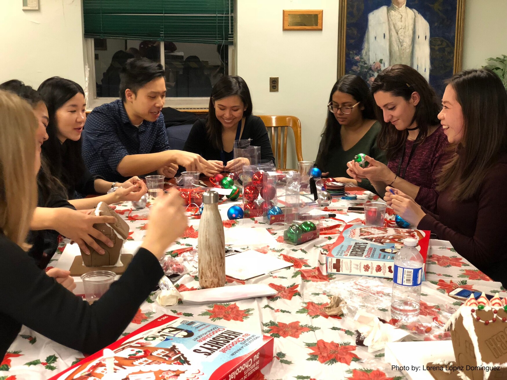 Students decorating gingerbread houses